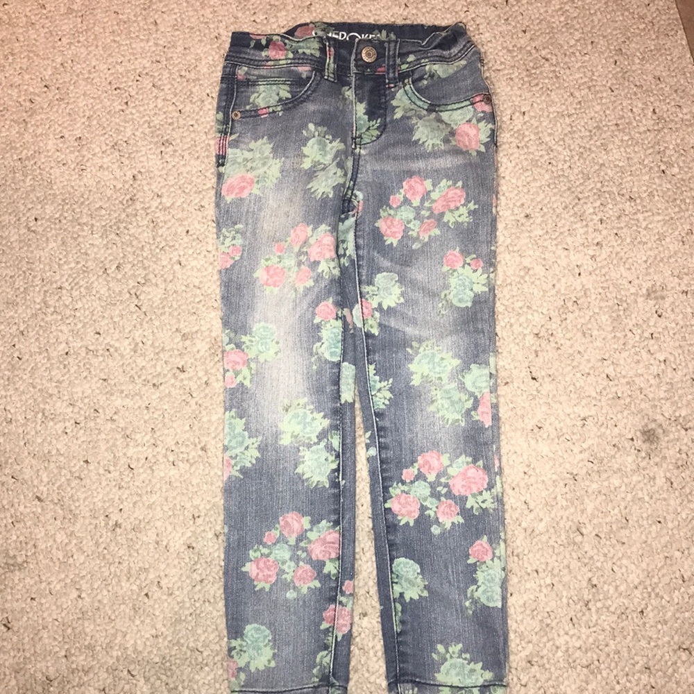 Girls flower jeans.